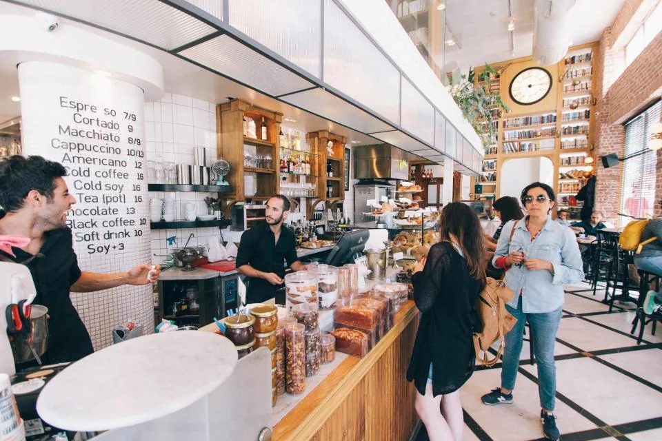 Staff serving a customer